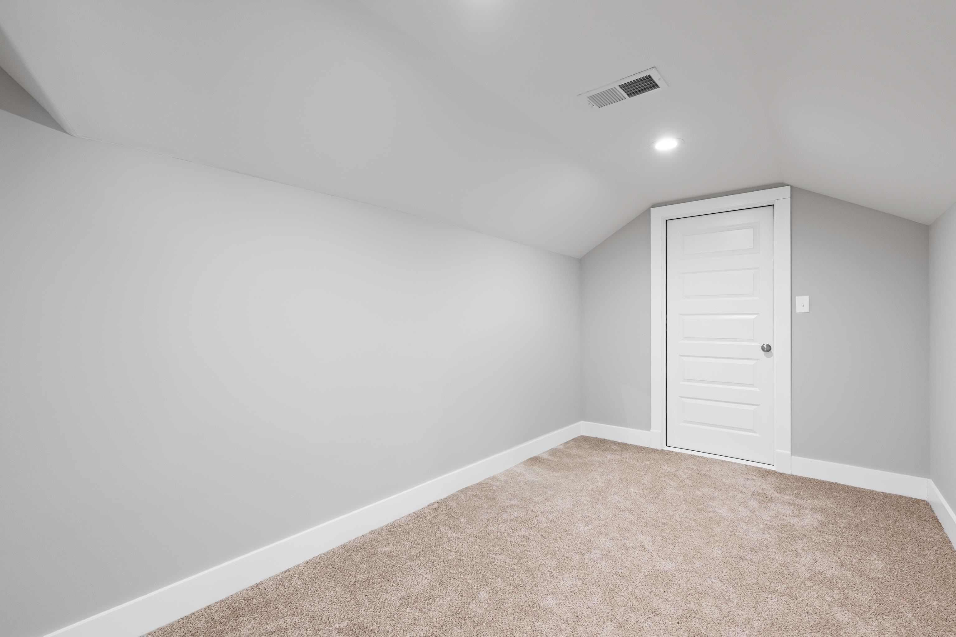 502 South Shea Road Collierville, TN 38017 - Photo 35 of 40 Additional living space with carpet floors and lofted ceiling