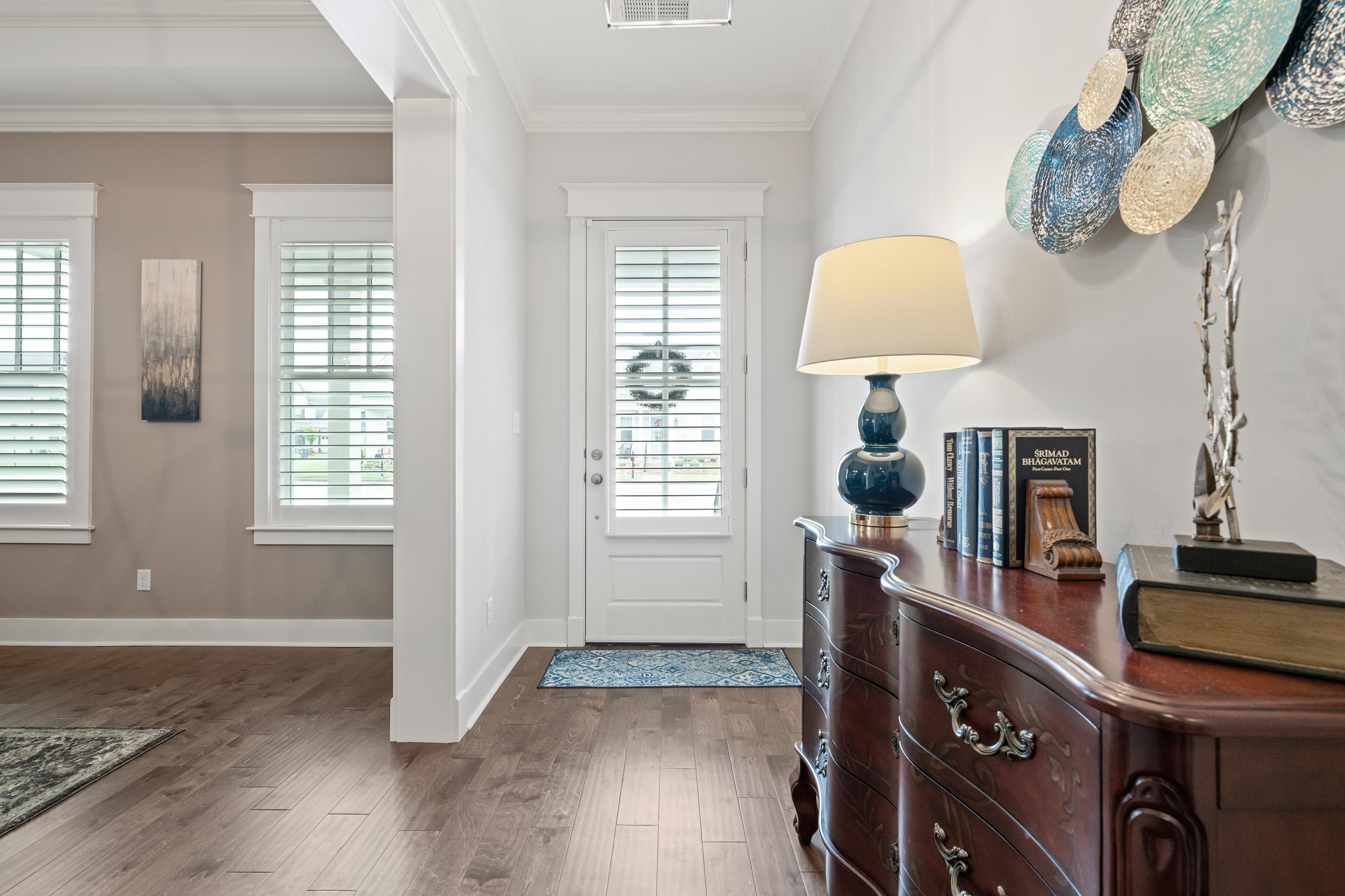 502 South Shea Road Collierville, TN 38017 - Photo 5 of 40 Foyer featuring dark hardwood / wood-style floors, crown molding, and plenty of natural light