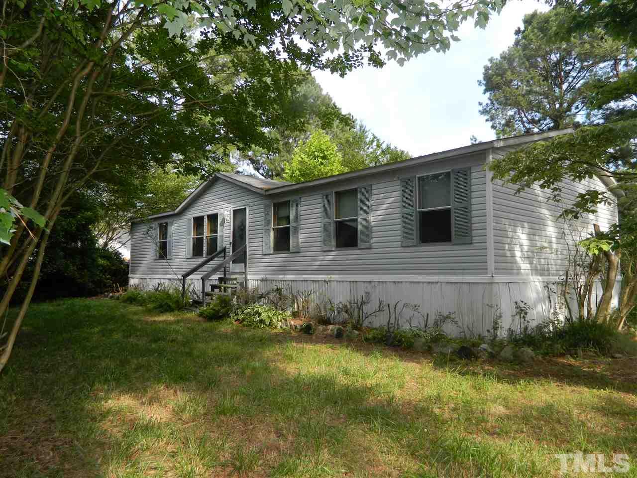 11977 Us 64 A Spring Spring Hope, NC 27882 - Photo 1 of 9 a view of a house with a yard