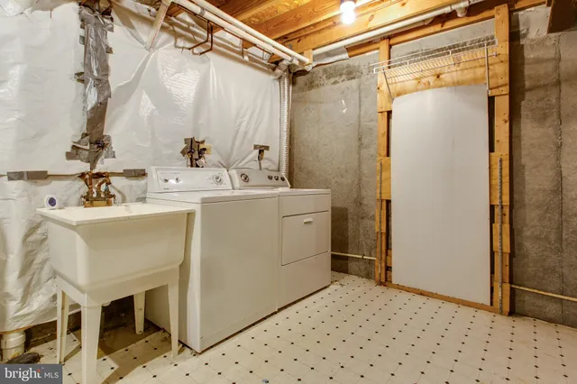 a utility room with dryer and washer