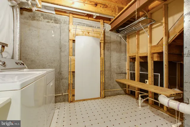 a view of a bathroom with a sink and a mirror