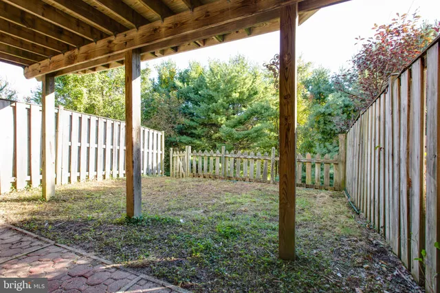 a view of a backyard with garden