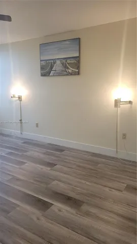 a view of a room with an empty space