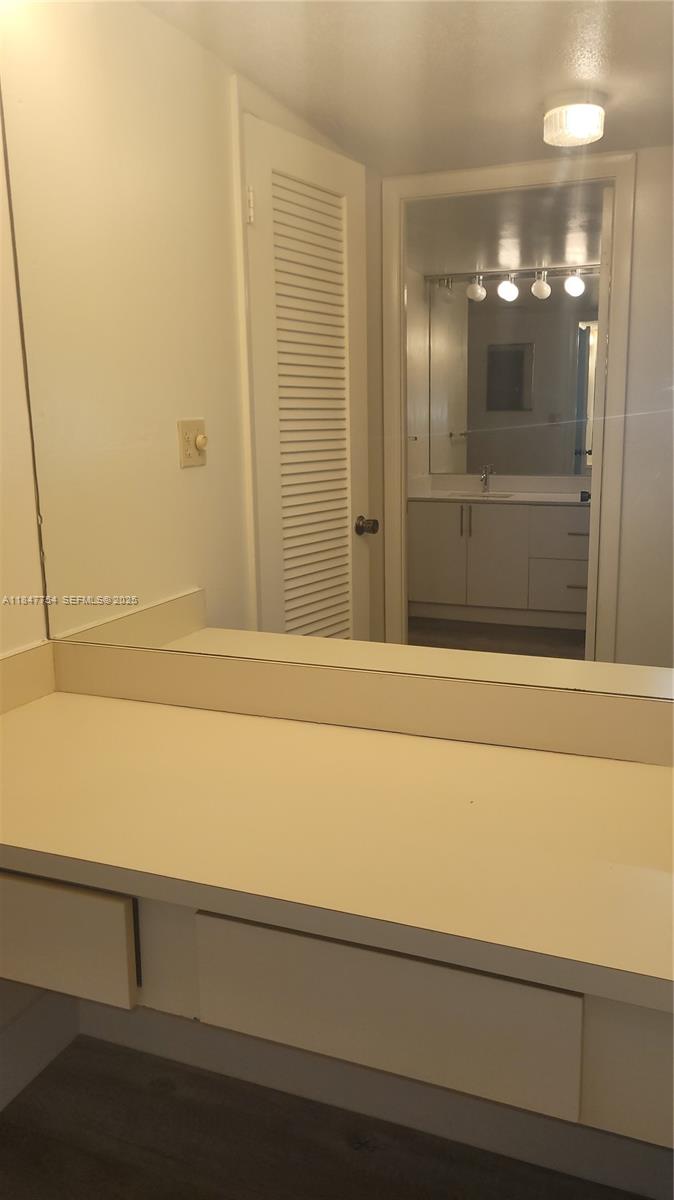 900 Northeast 195th Street, Unit 620 Miami, FL 33179 - Photo 19 of 28 a bathroom with a bathtub and shower