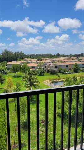 a view of a city skyline from a balcony