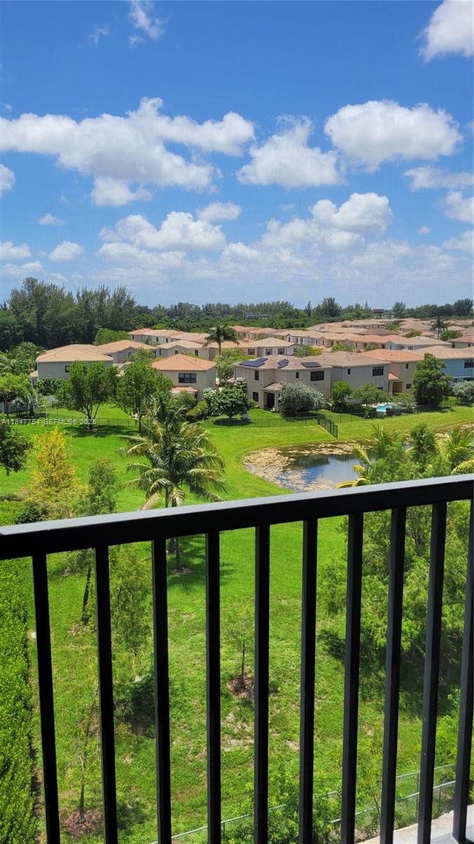900 Northeast 195th Street, Unit 620 Miami, FL 33179 - Photo 5 of 28 a view of a city skyline from a balcony