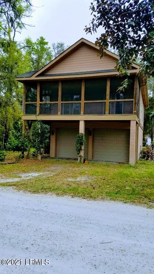 27 Triangle Road St. Helena Island, SC 29920 - Photo 1 of 12 Front