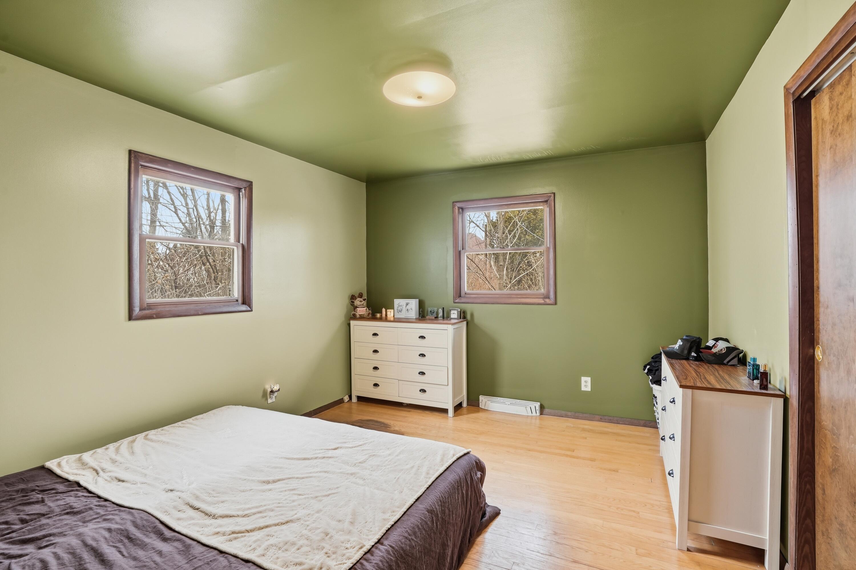 508 West 117th Place Crown Point, IN 46307 - Photo 7 of 20 a bedroom with a bed and a window
