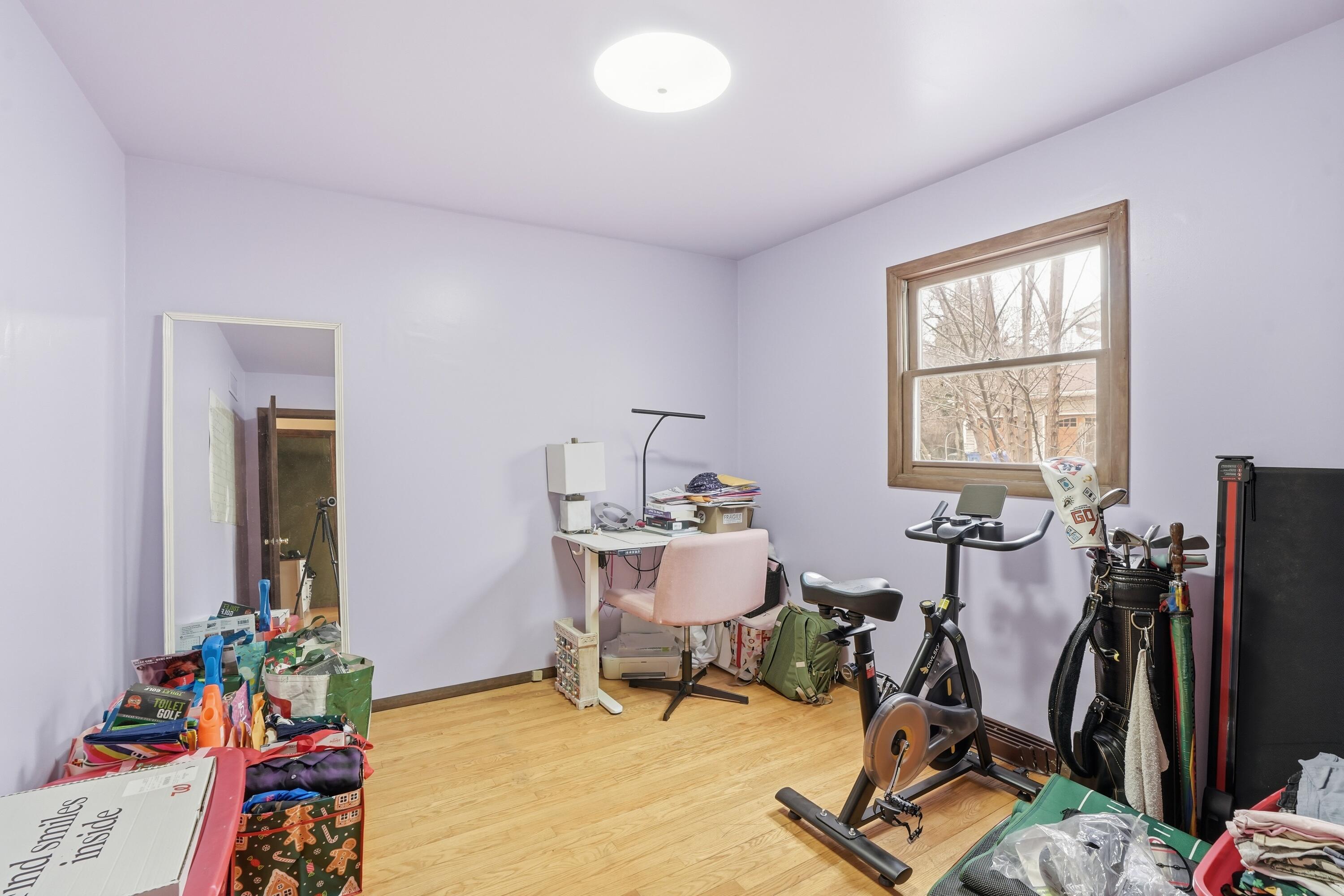 508 West 117th Place Crown Point, IN 46307 - Photo 10 of 20 a view of a workspace with furniture and a window