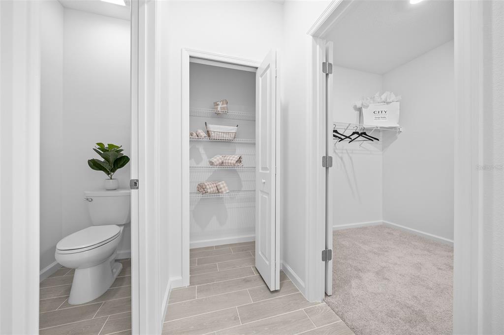 6880 Southwest 87th Street Ocala, FL 34476 - Photo 12 of 36 a bathroom with a shower and a toilet