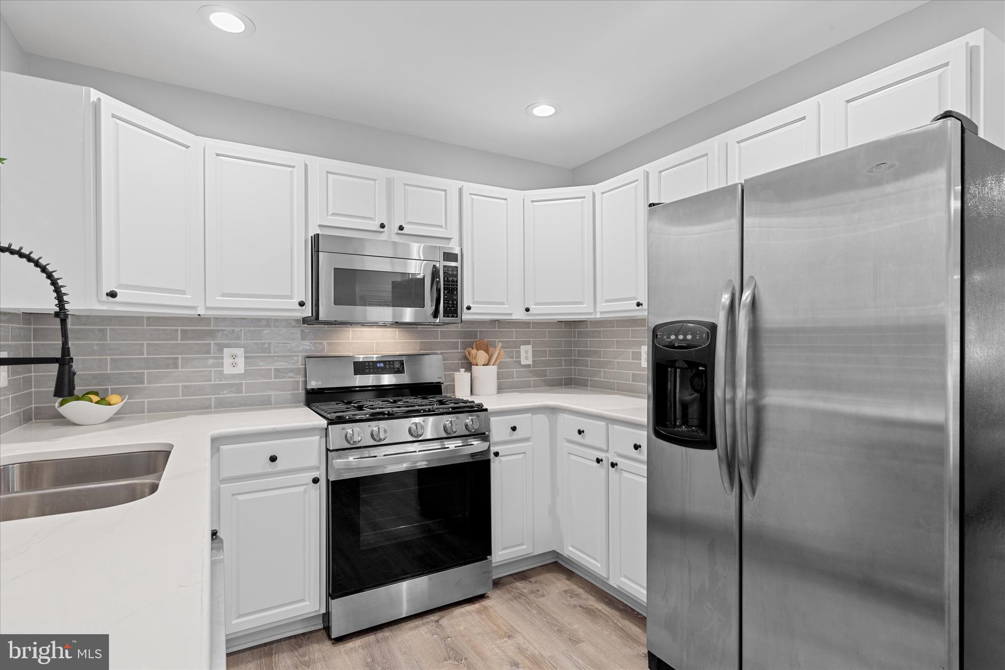2 Dinghy Court Ocean Pines, MD 21811 - Photo 18 of 74 a kitchen with a refrigerator stove and microwave