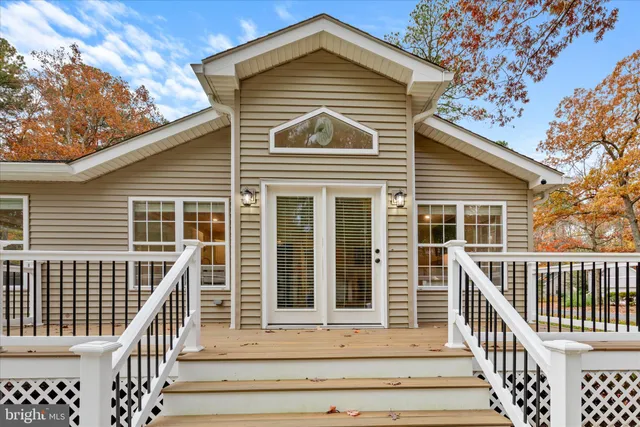 a front view of a house with a porch