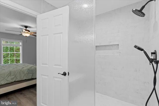 a view of a yard with a house and a tree