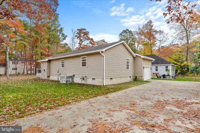 a view of a roof deck with patio