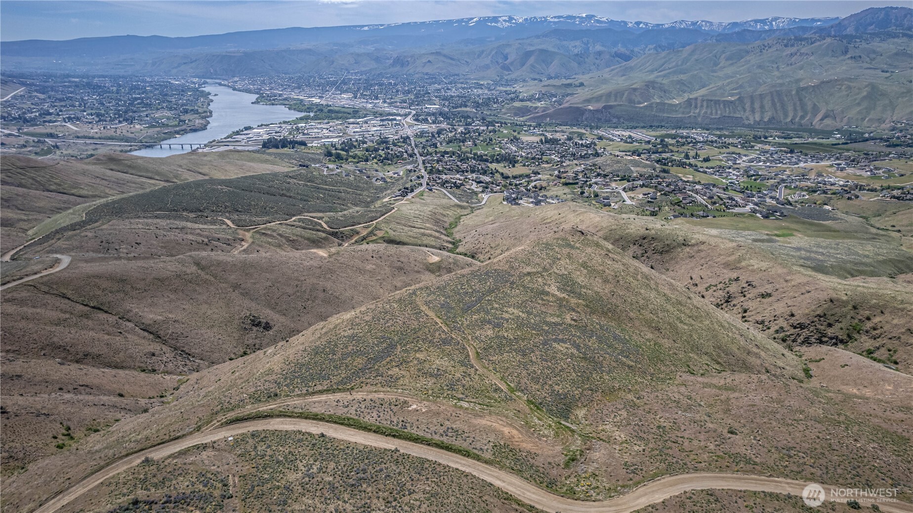 1 Burch Mountain Road Wenatchee, WA 98801 - Photo 23 of 34 a view of a dry yard with mountain
