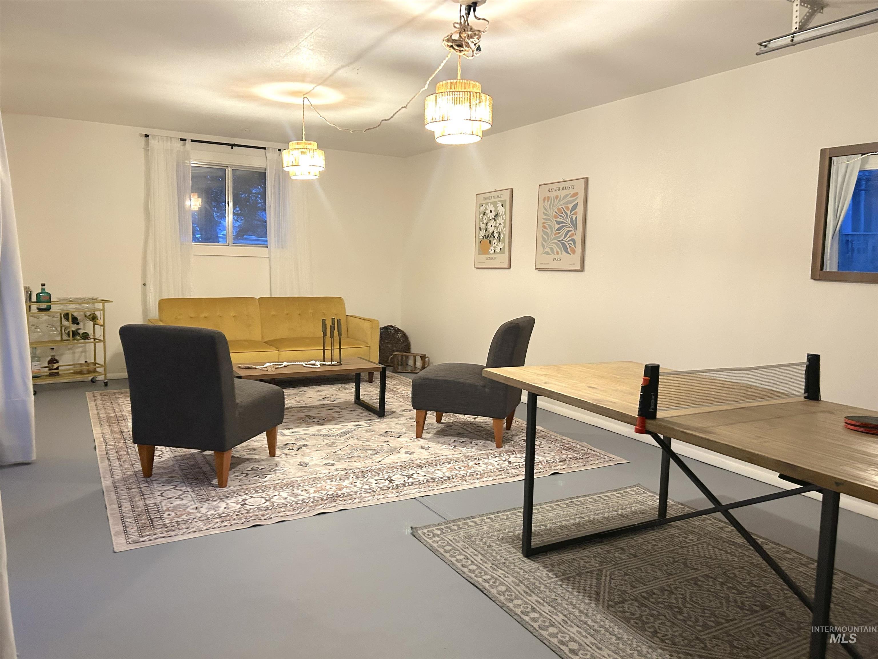 7985 South Cloverdale Road Boise, ID 83709 - Photo 33 of 49 Living area featuring concrete floors
