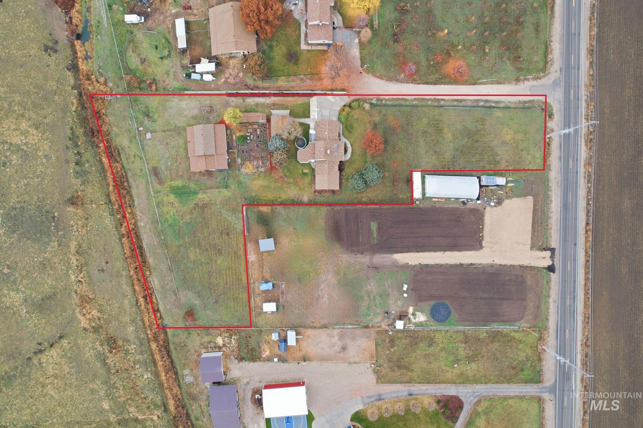 7985 South Cloverdale Road Boise, ID 83709 - Photo 48 of 49 Aerial view of property's location featuring property boundaries highlighted