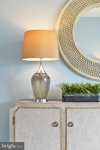 a bedroom with a bed and cabinets