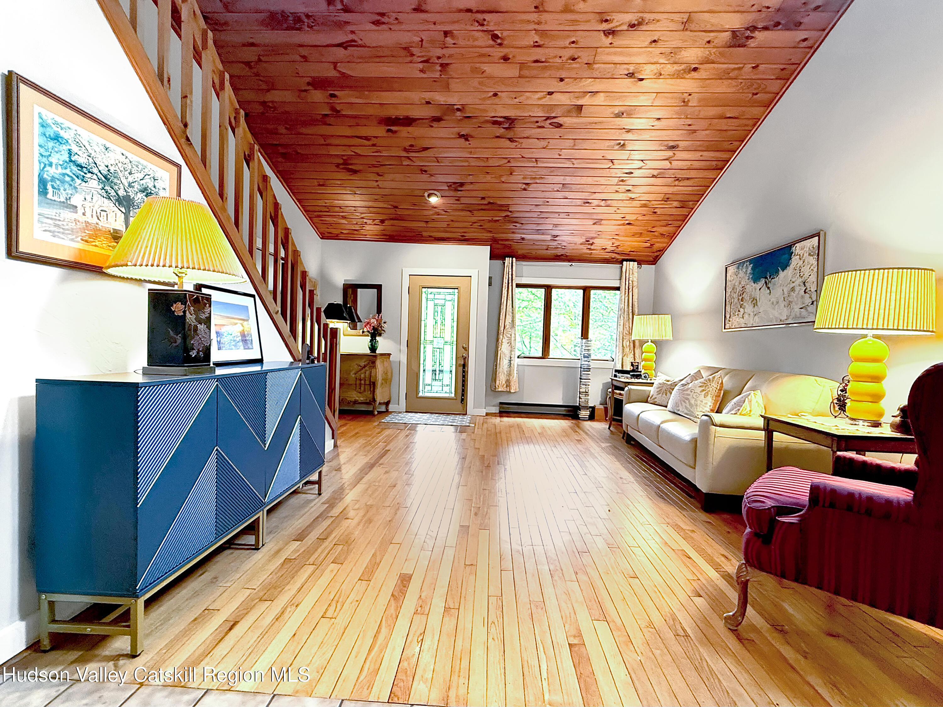 289 Red Falls Road Ashland, NY 12468 - Photo 11 of 44 a living room with furniture and a wooden floor