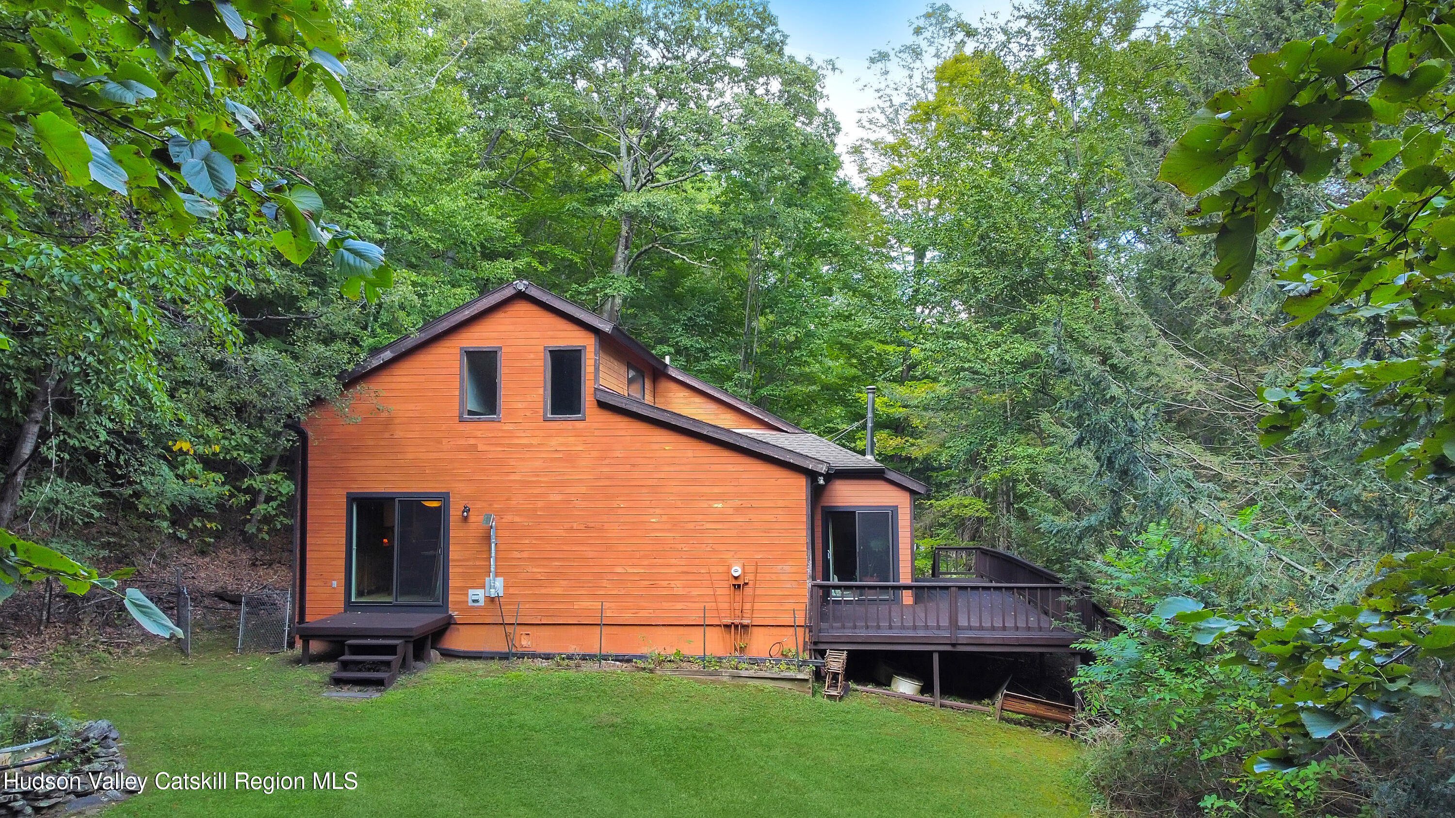 289 Red Falls Road Ashland, NY 12468 - Photo 2 of 44 a front view of a house with garden