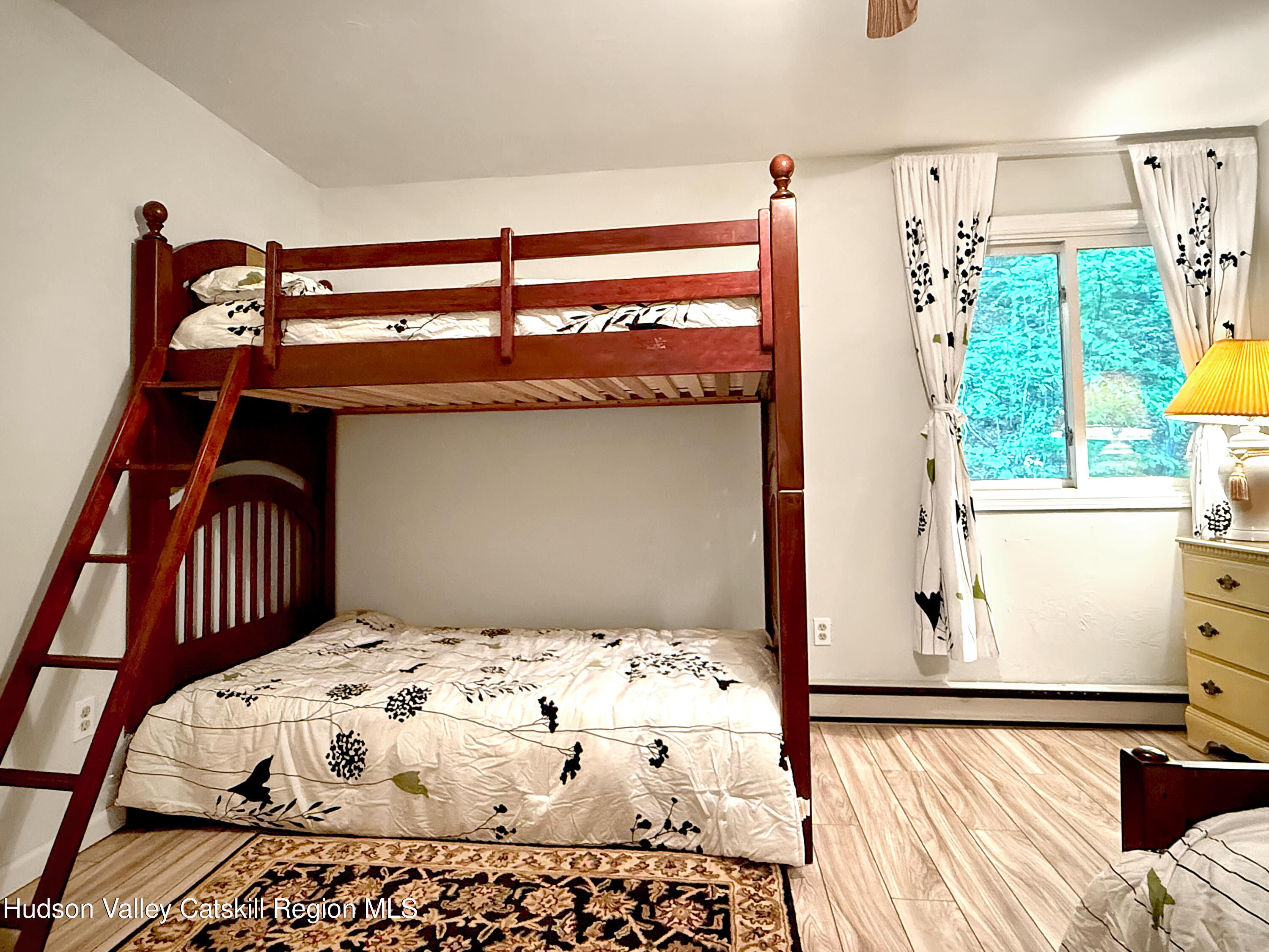 289 Red Falls Road Ashland, NY 12468 - Photo 25 of 44 a bedroom with a bed and a window