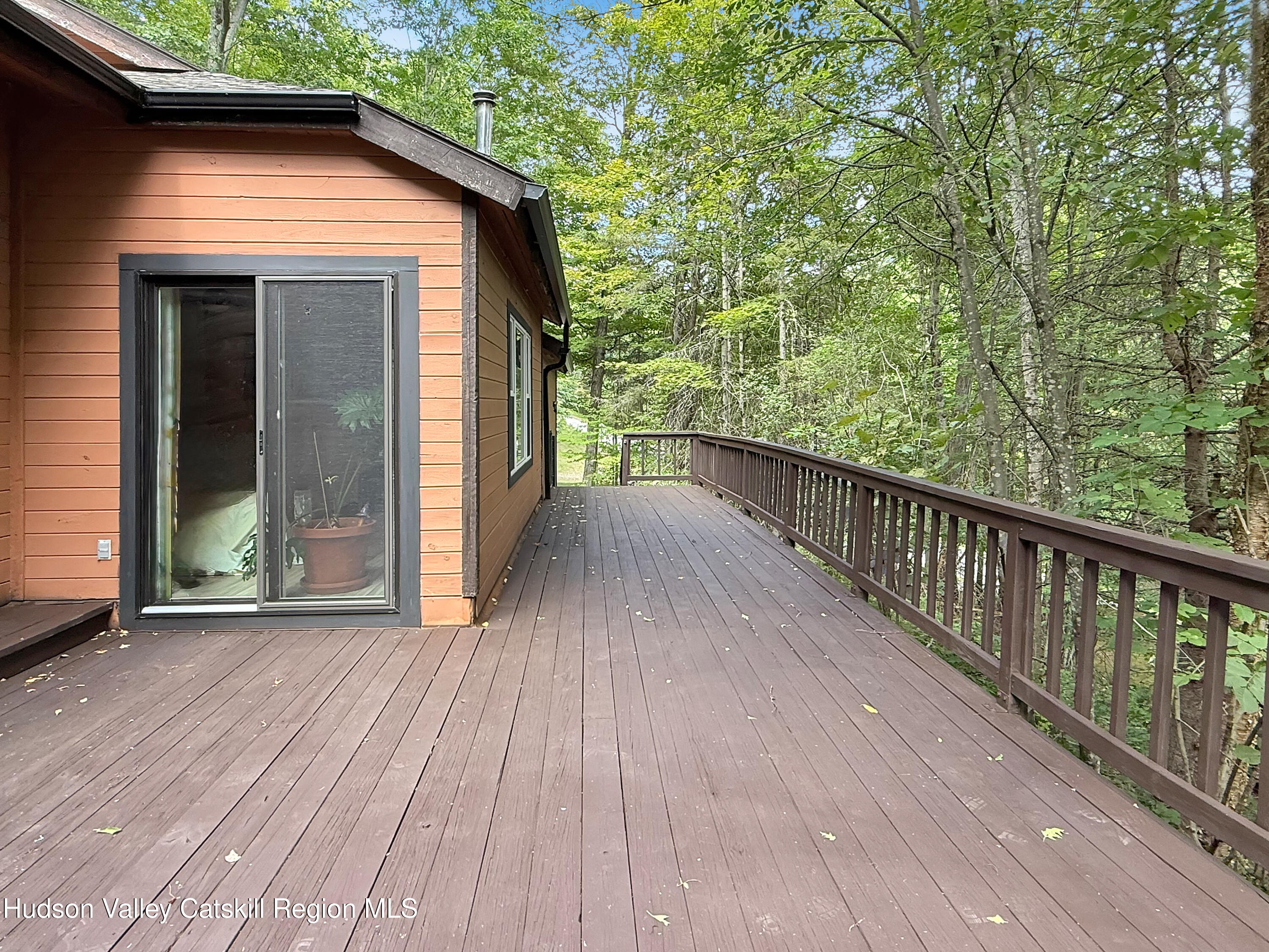 289 Red Falls Road Ashland, NY 12468 - Photo 5 of 44 a view of a house with a deck