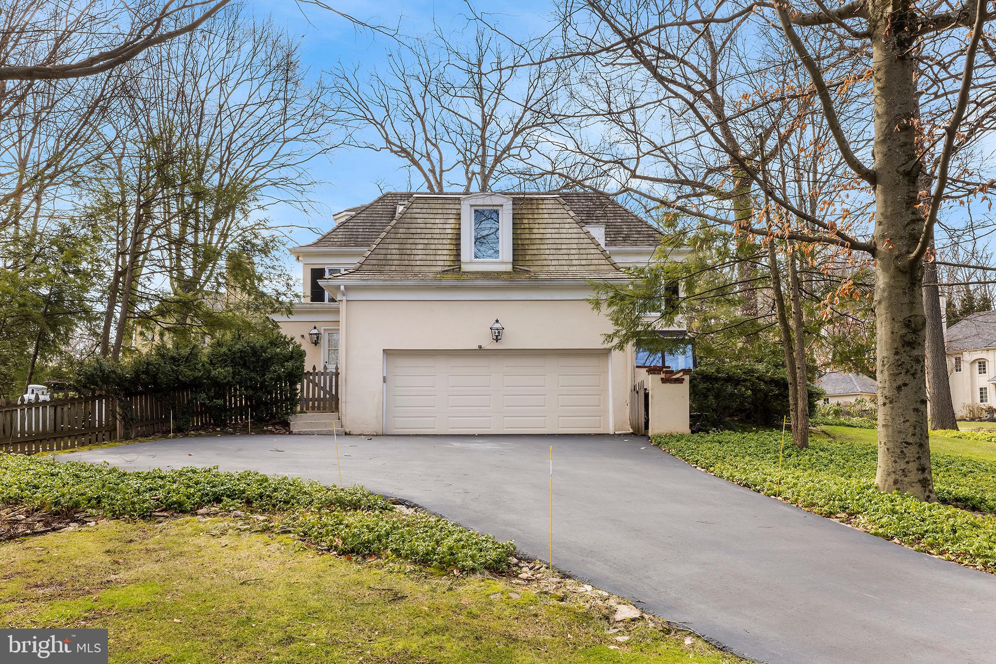 131 Woods Lane Wayne, PA 19087 - Photo 17 of 34 side load garage and driveway