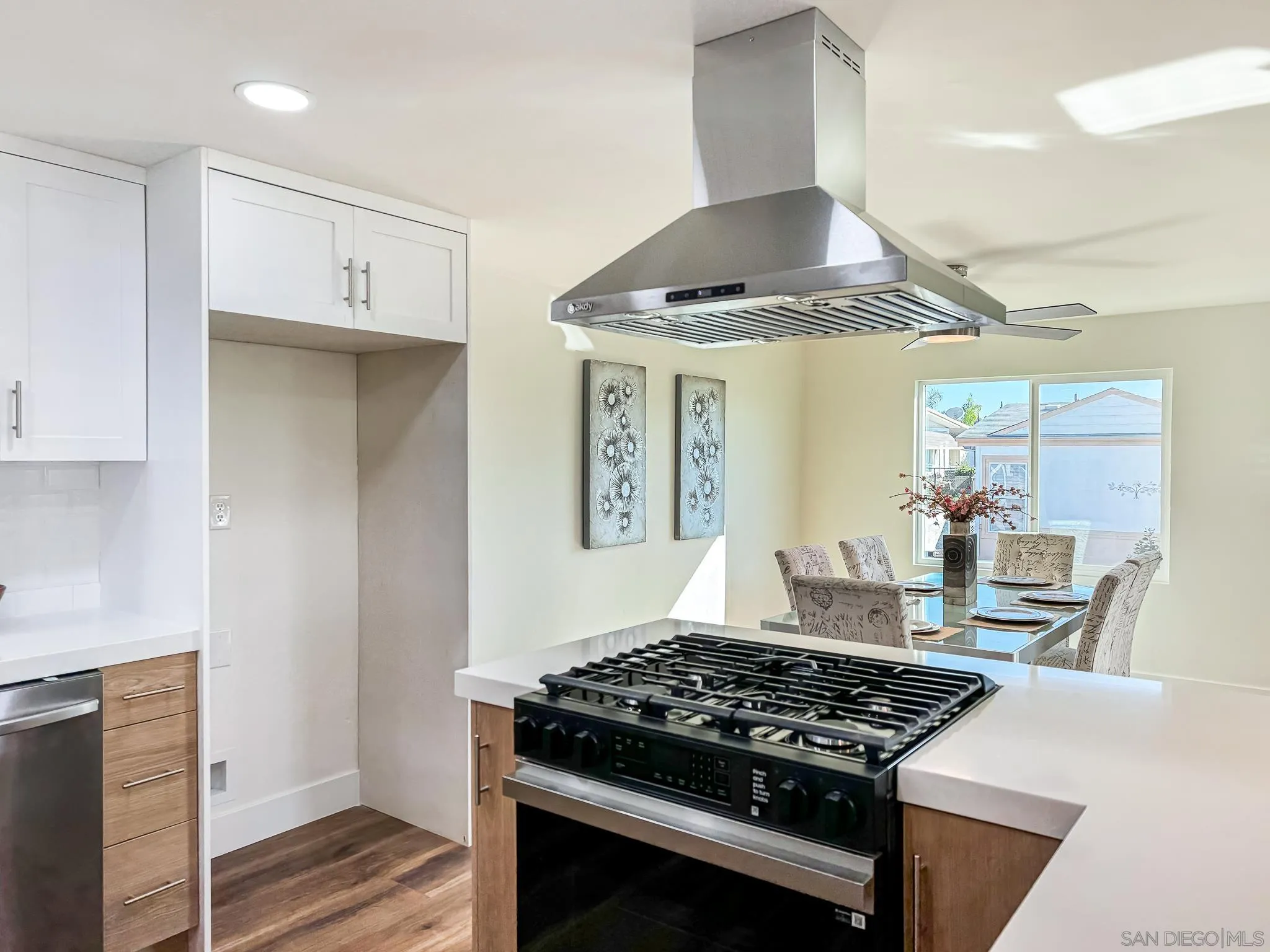 154 Falls View Lane Oceanside, CA 92056 - Photo 14 of 45 a kitchen with a stove and a refrigerator