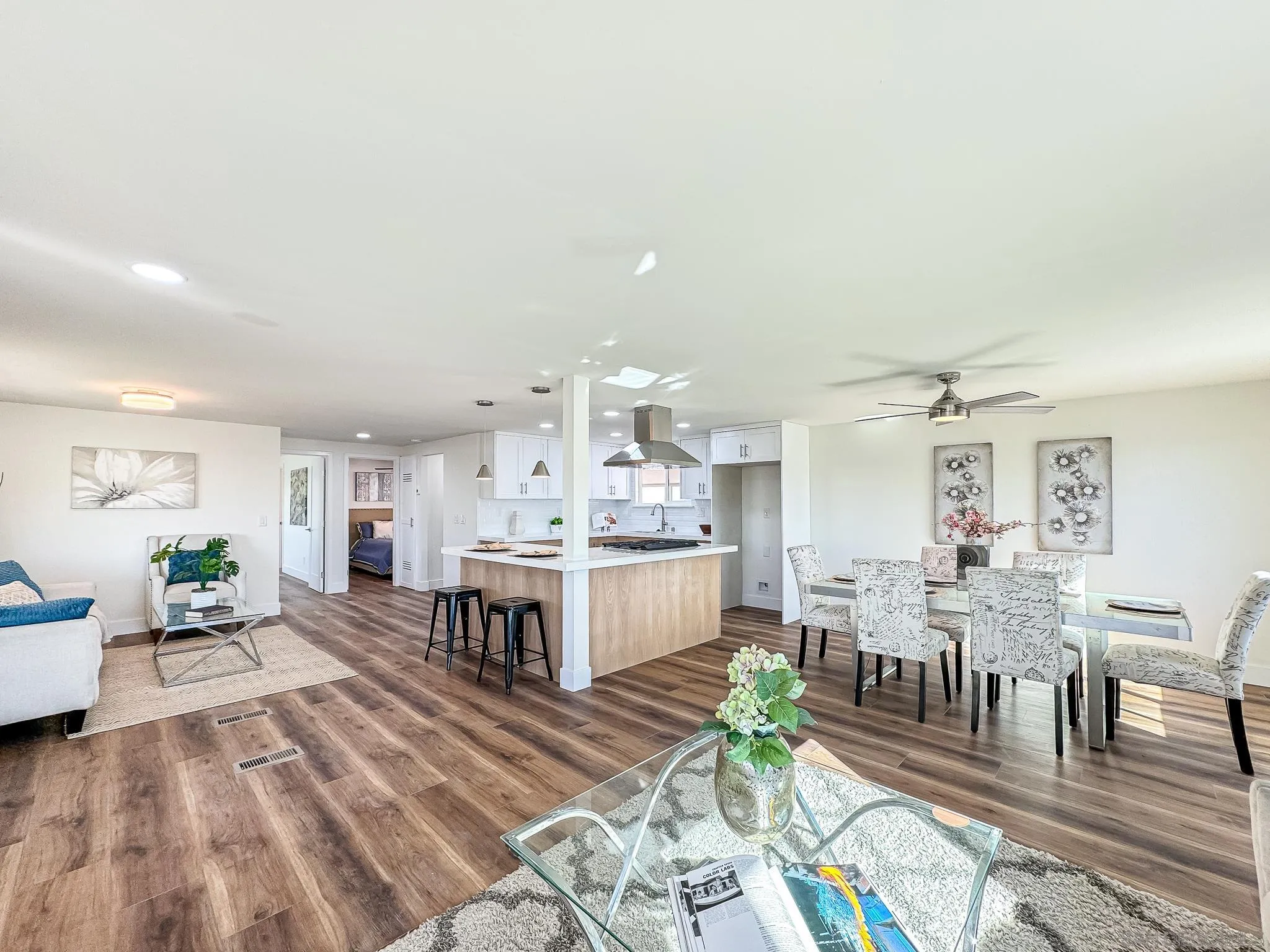 154 Falls View Lane Oceanside, CA 92056 - Photo 3 of 45 a living room with lots of furniture and kitchen view