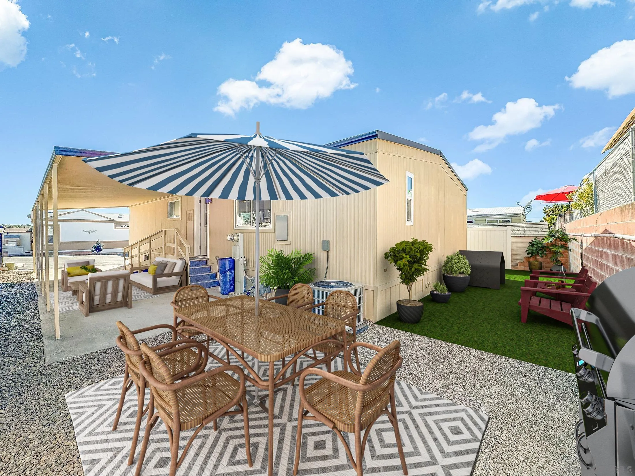 154 Falls View Lane Oceanside, CA 92056 - Photo 35 of 45 a patio with a patio table and chairs