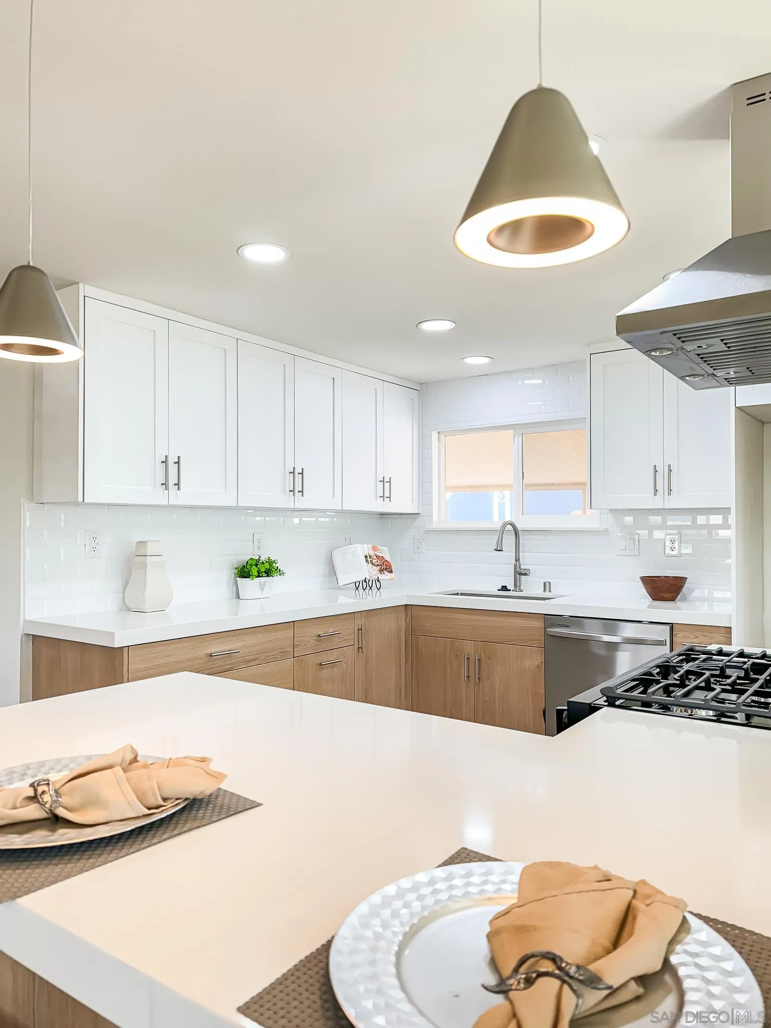 154 Falls View Lane Oceanside, CA 92056 - Photo 10 of 45 a large kitchen with cabinets