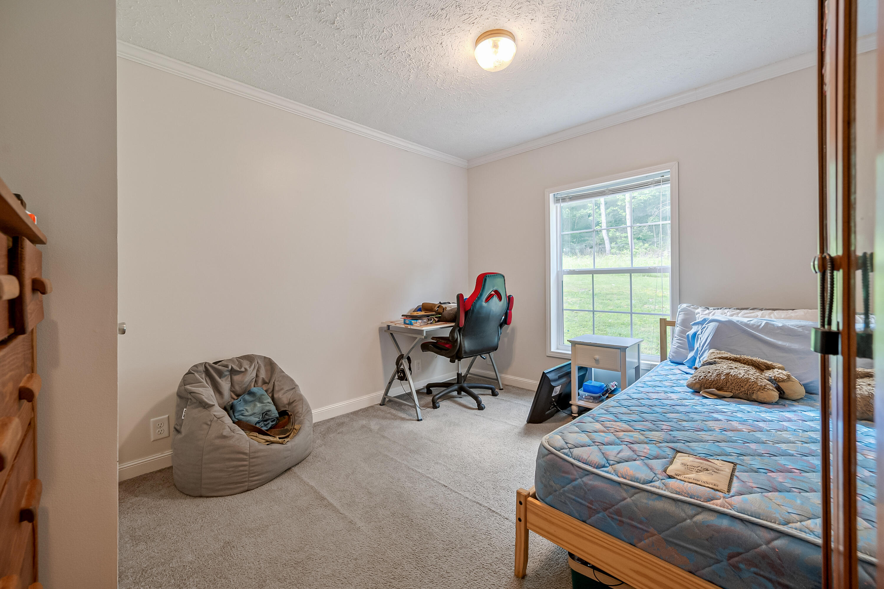 370 Ambrose Road Elliston, VA 24087 - Photo 32 of 63 a living room with furniture chess board and a window