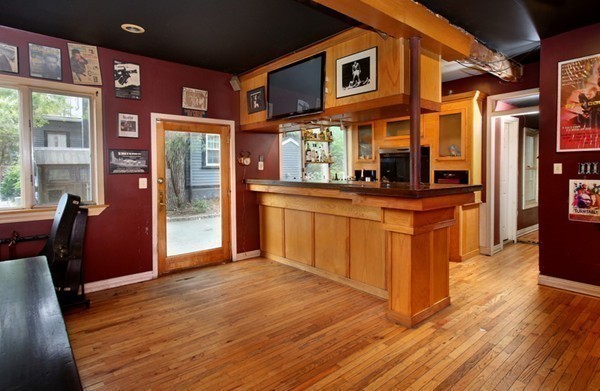 88 Lambert Avenue Boston, MA 02119 - Photo 16 of 19 a kitchen with stainless steel appliances granite countertop a stove and a wooden floors