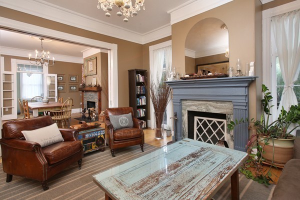 88 Lambert Avenue Boston, MA 02119 - Photo 6 of 19 a living room with furniture and a fireplace