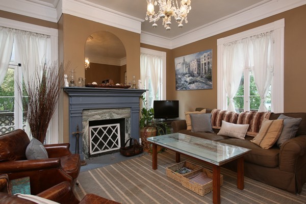 88 Lambert Avenue Boston, MA 02119 - Photo 7 of 19 a living room with furniture and a fireplace