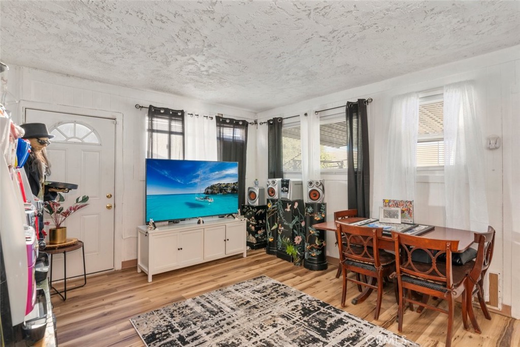 27262 Embassy Street Menifee, CA 92586 - Photo 18 of 35 a view of a livingroom with furniture and a window
