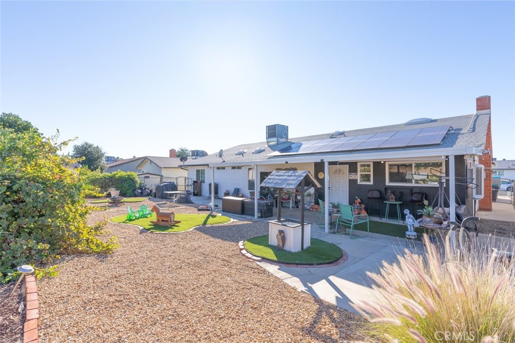 27262 Embassy Street Menifee, CA 92586 - Photo 28 of 35 an outdoor space with furniture and garden