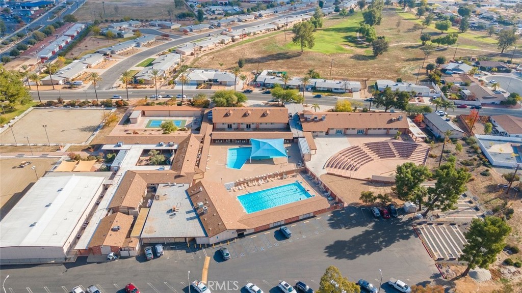 27262 Embassy Street Menifee, CA 92586 - Photo 31 of 35 an aerial view of residential houses with outdoor space