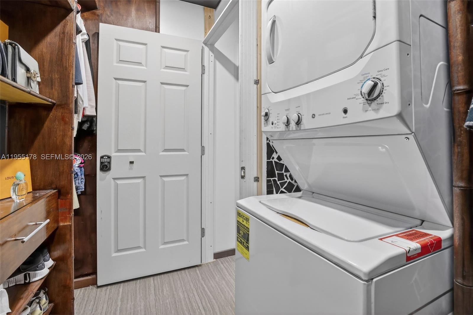 1720 Harrison Street, Unit 14H Hollywood, FL 33020 - Photo 21 of 37 a utility room with dryer and washer