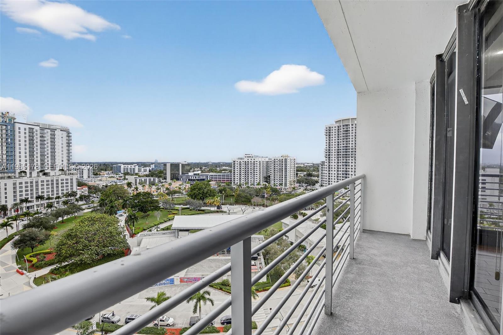1720 Harrison Street, Unit 14H Hollywood, FL 33020 - Photo 22 of 37 a view of a city from a balcony