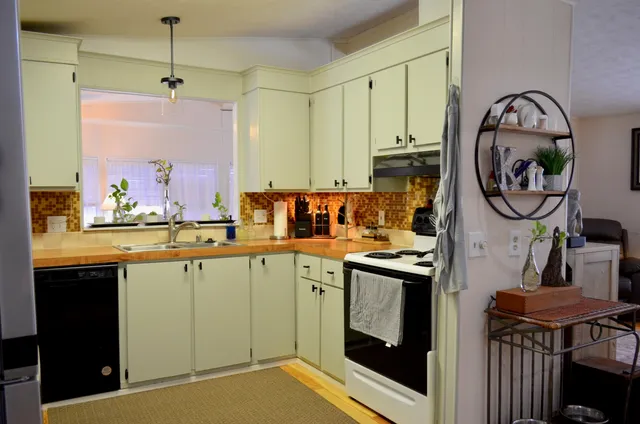a bathroom with a sink double vanity and a mirror