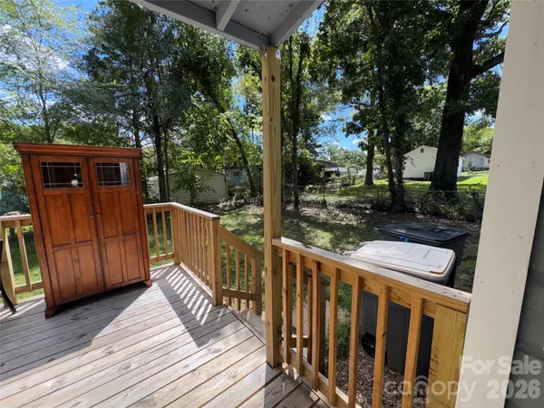 a view of outdoor space with deck and wooden floor