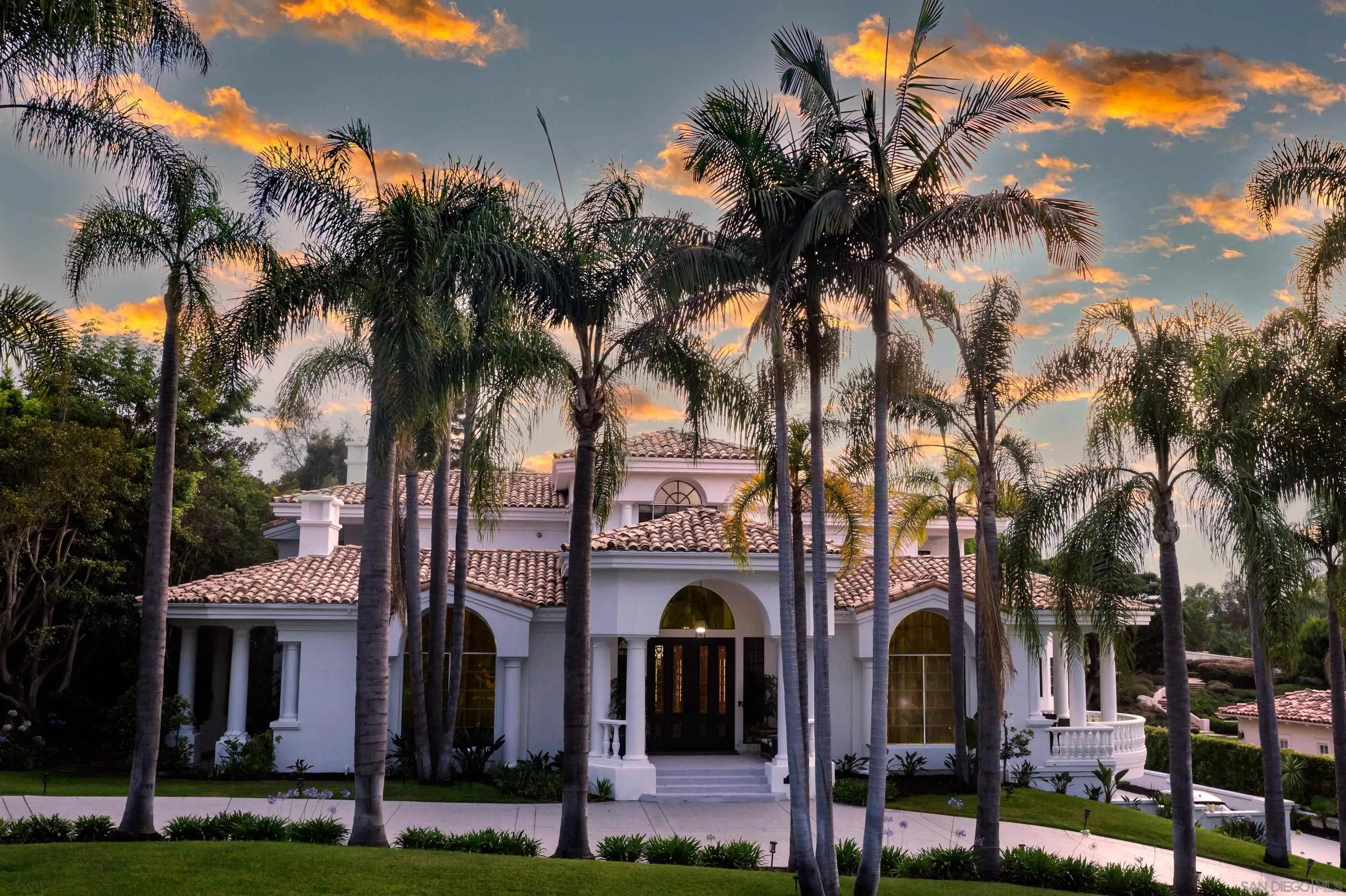17101 Circa Oriente Rancho Santa Fe, CA 92067 - Photo 1 of 35 front view of a building with a garden