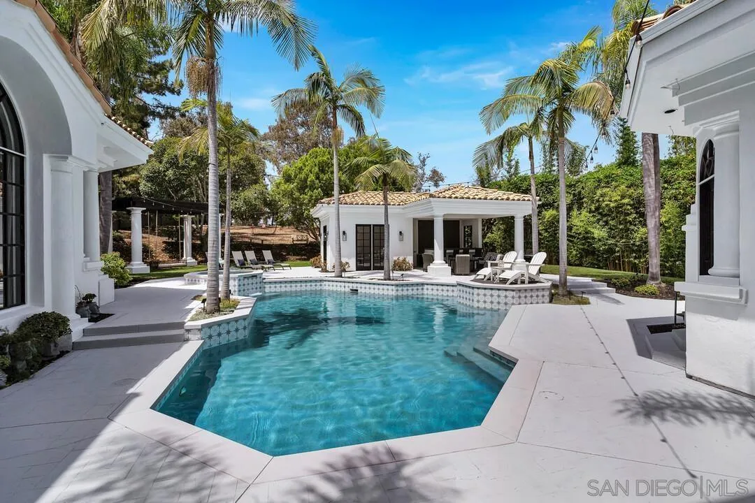 17101 Circa Oriente Rancho Santa Fe, CA 92067 - Photo 20 of 35 a view of a patio with couches table and chairs and potted plants