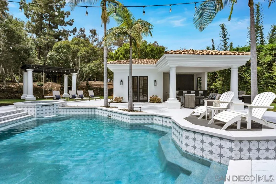 17101 Circa Oriente Rancho Santa Fe, CA 92067 - Photo 21 of 35 a view of a house with swimming pool and porch with furniture