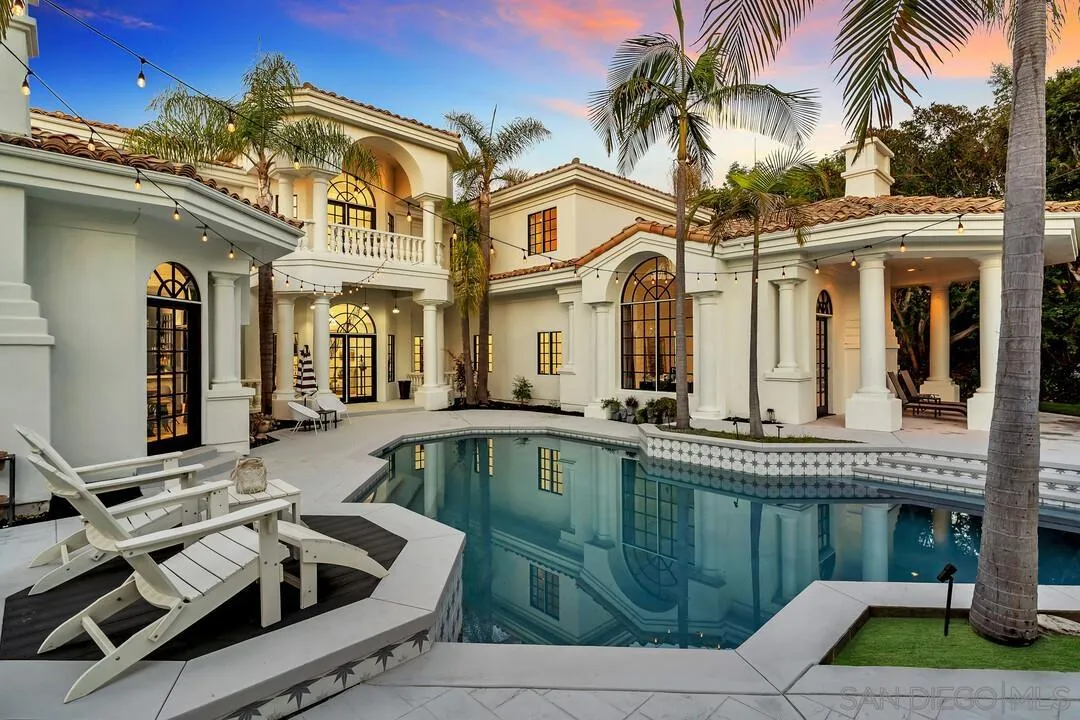 17101 Circa Oriente Rancho Santa Fe, CA 92067 - Photo 24 of 35 a front view of a house with swimming pool having outdoor seating
