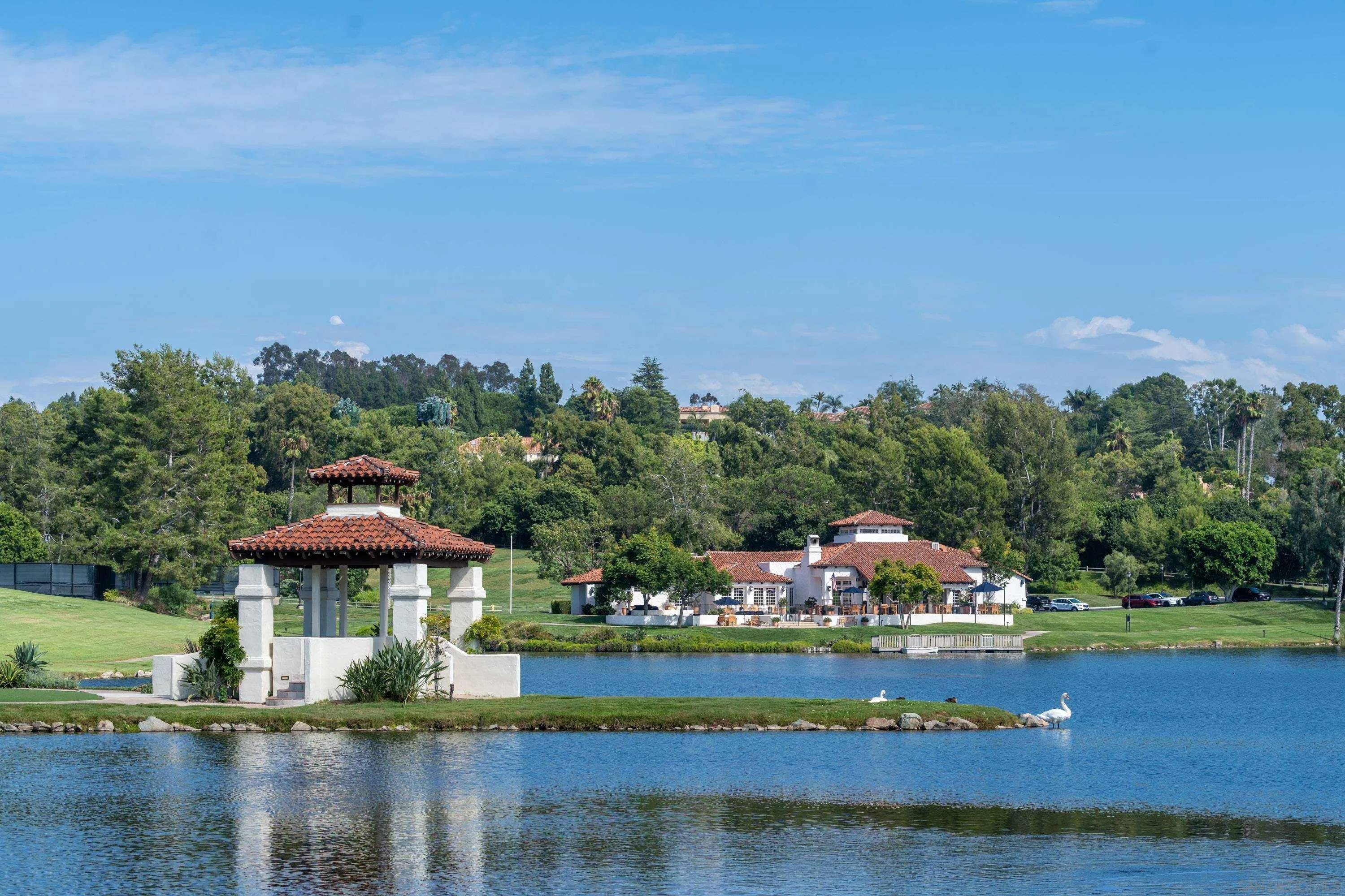 17101 Circa Oriente Rancho Santa Fe, CA 92067 - Photo 32 of 35 a view of a lake with a garden