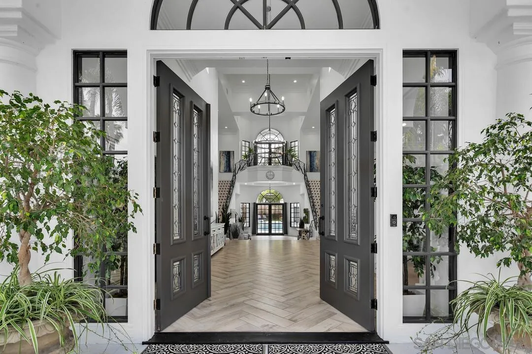 17101 Circa Oriente Rancho Santa Fe, CA 92067 - Photo 4 of 35 a view of living room filled with furniture and entryway