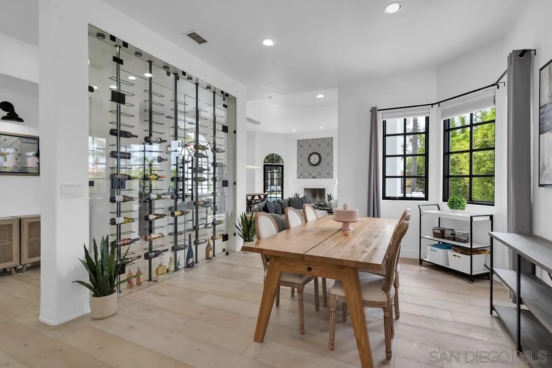 17101 Circa Oriente Rancho Santa Fe, CA 92067 - Photo 6 of 35 a view of a dining room with furniture window and outside view
