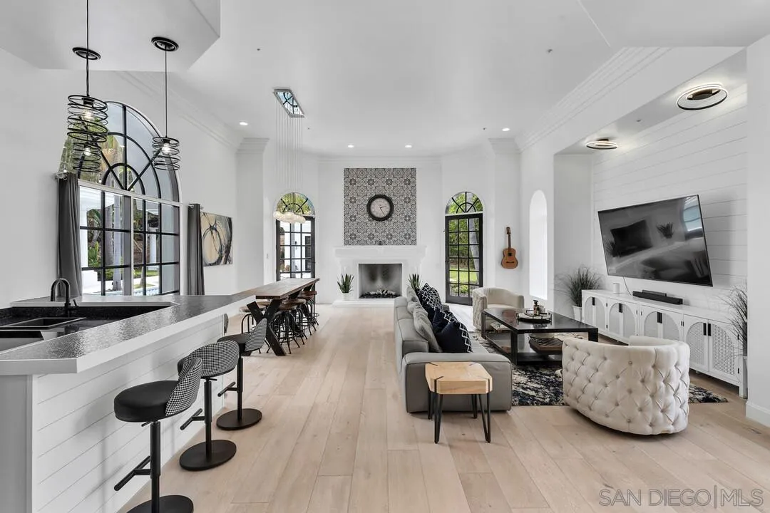 17101 Circa Oriente Rancho Santa Fe, CA 92067 - Photo 7 of 35 a living room with furniture and a flat screen tv